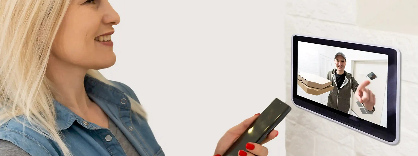 Woman using a smart device to communicate with delivery person.