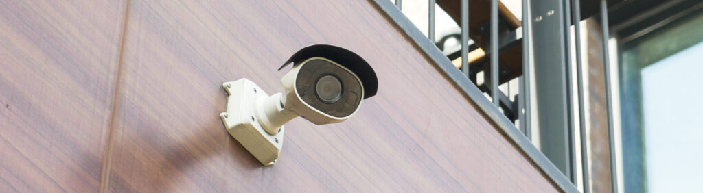 CCTV security camera mounted on a wall.